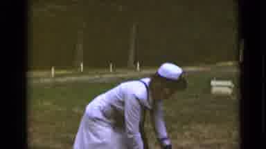 New York (1947): Woman Plays With Cute Dog In A Grass Field Old Video
