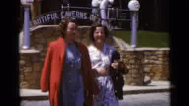 New York (1947): Two Women Walking Away From Arch Sign That Reads Beautiful