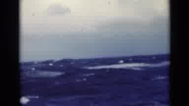 Persian Gulf (1947): Vibrant Blue Ocean Waves Extend Out To The Horizon Under A