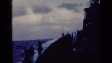 Persian Gulf (1947): A Big Boat Cruising The Rough Blue Sea And Cloudy Sky