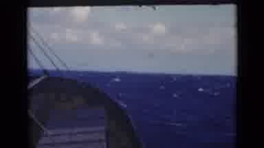 Persian Gulf (1947): A Large Boat Sails The Blue Water With The Waves Calmly