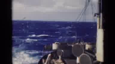 Persian Gulf (1947): Large Ship Slowly Moving Along Large Blue Waves In The Open