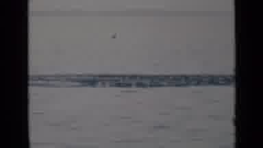 Persian Gulf (1947): View Of The Ocean On A Cloudy Day With A Mild Surf In The