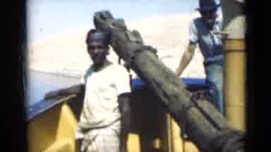 Suez Canal Egypt (1946): Men Sailing In A Sea On The Shores Of A Sandy Desert