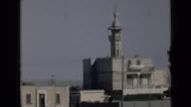 Suez Canal Egypt (1946): Moving View Of A Tall Building Near Other Buildings In A