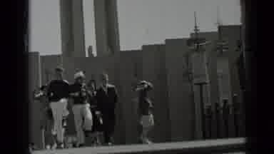 San Francisco California-1937: Young Adults Stroll Near Goodyear Blimp