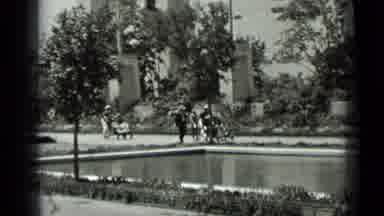 San Francisco California (1937): People Walking With A Stroller Or A Wheelchair