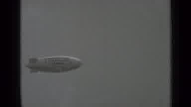 San Francisco California (1937): The Blimp With Writing On The Side Floats Through