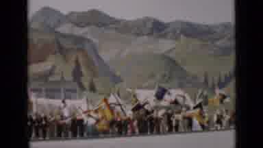 San Francisco California (1937): People Wave Colorful Flags As A Wagon Train