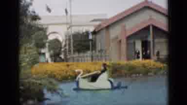 San Francisco California (1937): People Riding In Swan Shaped Paddle Boats On Body