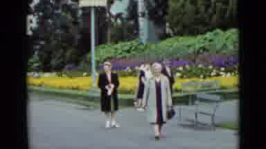 San Francisco California (1937): Well-Dressed Women Walking On The Flower-Filled