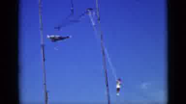 San Francisco California (1937): Two People Swinging And Rotating In Air