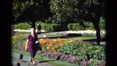 San Francisco California (1937): A Lilas Woman Walking On A Square Full Of Flowers