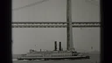 San Francisco California (1937): A Ship Passing Through A Bridge And Then A Rock