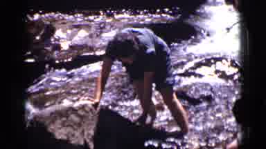 Colorado USA (1938): A Rapidly Flowing River Of Water With Rocks Creating Rapid