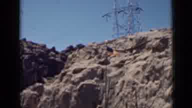 Arizona USA (1939): Woman Wearing Blue Shirt Sitting On Concrete Rail On A Bright