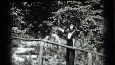 Clear Lake California (1939): Woman Smiling And Waving While Walking Up Stone