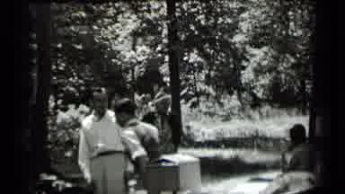 Clear Lake California (1939): Friends In The Park Working Together On A Warm Day