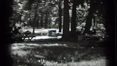 Clear Lake California (1939): Campsite With People Sitting At A Picnic Table Next