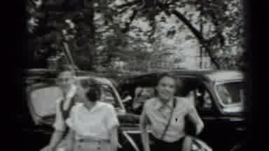 Clear Lake California (1939): Moving Shot Of People Sitting And Standing Near Many