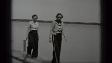 Clear Lake California (1939): Two Women Walk Down Wooden Pier Plank On A Cloudy