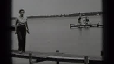 Clear Lake California (1939): A Woman Walks On A Wooden Dock Followed By A Mature