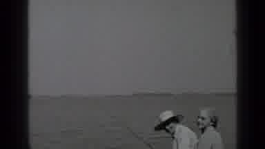 Clear Lake California (1939): Husband And Wife Fishing On A Bench By The Ocean