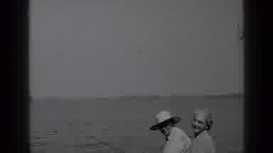 Clear Lake California (1939): An Elderly Couple Fishing On The Banks Of A River Or