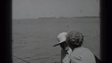 Clear Lake California (1939): Black And White Video Of Two People Sitting In A