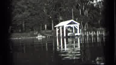 Clear Lake California (1939): A Man On A Boat Recording What Appears To Be A