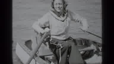 Clear Lake California (1939): Lady Rowing In A Row Boat On A Lake Looking Happy