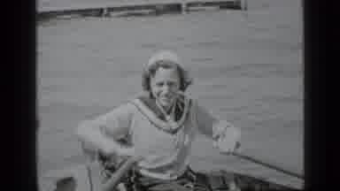 Clear Lake California (1939): Young Girl Is Rowing A Canoe While A Father And Son