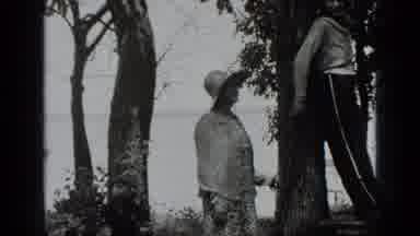 Clear Lake California (1939): A Boy And A Girl In The Woods Having Fun