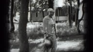 Clear Lake California (1939): Black And White Film Of Middle Aged Woman Holding