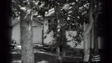 Clear Lake California (1939): A White House With White Shed On A Sunny Day