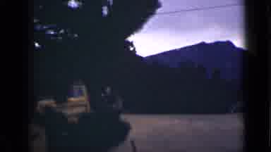 Colorado USA (1939): Two Tourists Watch Birds Fly Away Into The Mountains