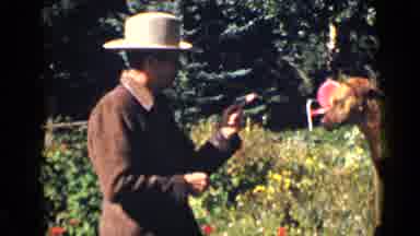 Colorado USA (1939): Cowboy Trains Red Dog While Tipping His Hat In The Woods