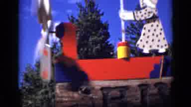 Colorado USA (1939): View Of Red White And Blue Windmill Of Woman Churning Butter