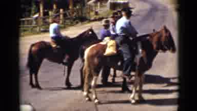 Colorado USA (1939): Four People On Horseback On Street In Country Setting On