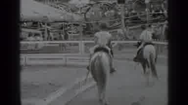 New York USA (1939): Kids Riding Horses In Carnival The Carnival Rides