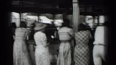 New York USA (1939): People Watching Riders At Carnival In Bumper Cars