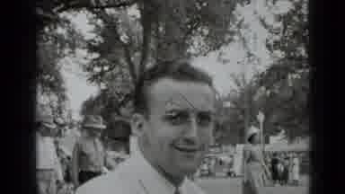New York USA (1939): Man Makes Half Smile And Looks At His His Children On The