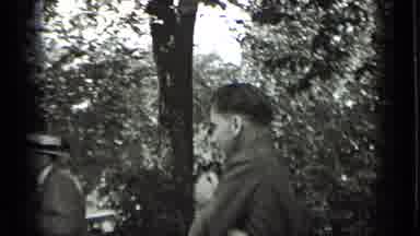 New York USA (1939): Men And Women In Suits And Dress Reacting To Camera