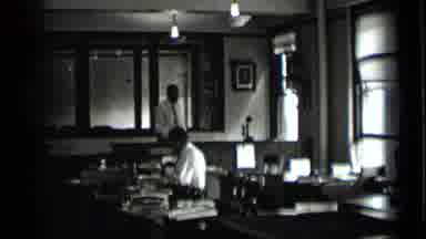 New York USA (1939): Three Men Busy Themselves Late Into The Day In Their Office