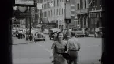New York USA (1939): Men And Women Of The Past Century Walking On The Sidewalk Of