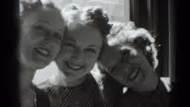 New York USA (1939): Three Girls Pose Together While Fourth Fusses With Bow In