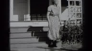 New York USA (1939): Woman Outside Of A Home