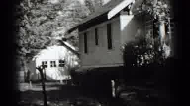New York USA (1939): The Camera Spans A White House With A Pretty Landscaping