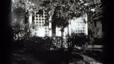 New York USA (1939): Moving Down A Suburban Street And Seeing The Garage And Front