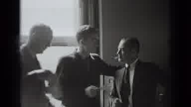 New York USA (1939): A Group Of Men Standing Around Talking To Each Other
